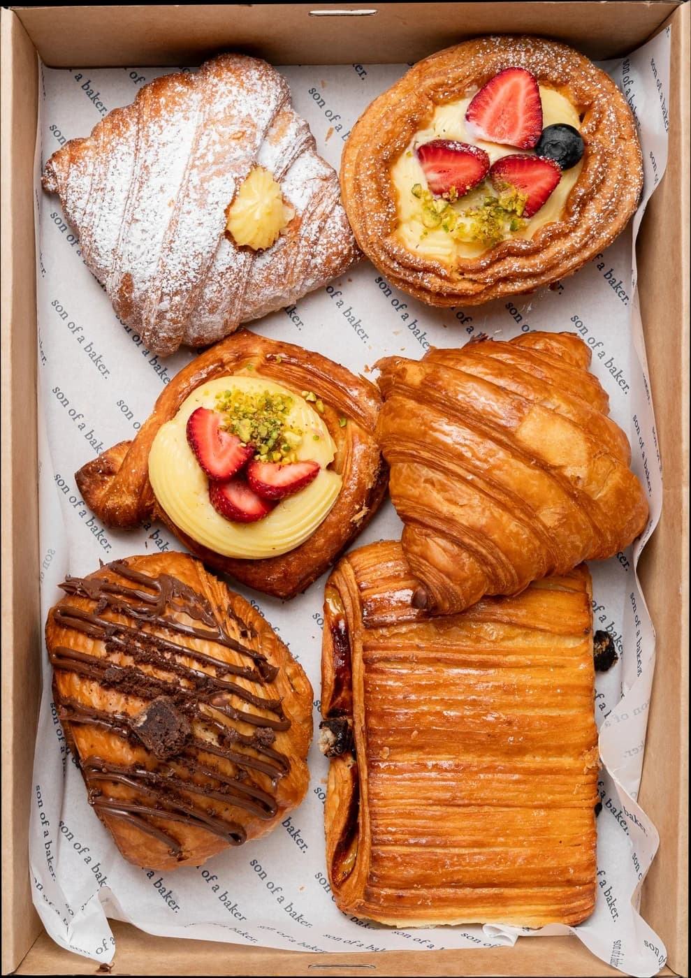A Son of a Baker box of pastries seen from above