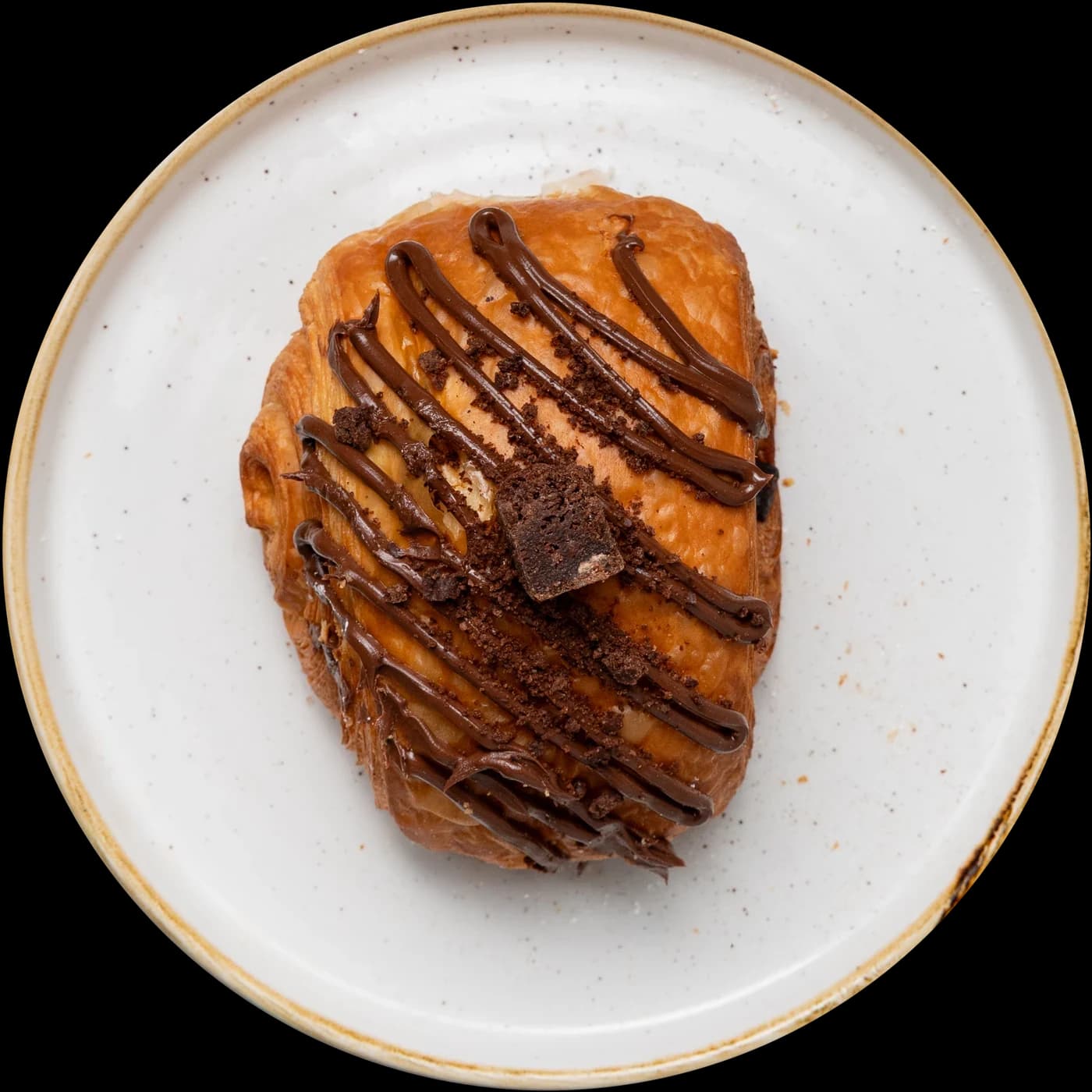 Pastry with chocolate drizzle